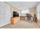Comfortable home office with neutral walls, carpet, and a wooden desk, perfect for working from home at 5964 S Florence Ct, Englewood, CO 80111