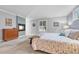 Inviting main bedroom with carpet floors, fireplace, and neutral colors, creating a peaceful retreat at 5964 S Florence Ct, Englewood, CO 80111