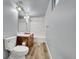 Bathroom with a modern vanity, toilet and tiled shower/tub combo, all freshly painted at 2311 Emery Pl, Longmont, CO 80501