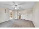 Spacious carpeted main bedroom with access to the ensuite bathroom and walk-in closet at 2311 Emery Pl, Longmont, CO 80501