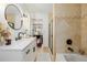 Stylish bathroom with modern vanity, soaking tub, and glass shower at 3929 Shoshone St, Denver, CO 80211