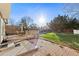 Brick patio, deck, and spacious grassy backyard at 1749 Foster Dr, Longmont, CO 80501