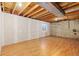 Unfinished basement with exposed beams and flooring at 1749 Foster Dr, Longmont, CO 80501