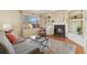 Cozy Gathering room with fireplace and built-in shelving at 1749 Foster Dr, Longmont, CO 80501