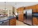 Eat-in kitchen with stainless steel appliances and ample counter space at 1749 Foster Dr, Longmont, CO 80501