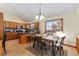 Kitchen boasts ample cabinetry, an island, and a dining area at 1749 Foster Dr, Longmont, CO 80501