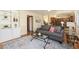 Living room with open concept and built-in shelving at 1749 Foster Dr, Longmont, CO 80501