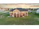 A vast backyard accents this lovely home featuring a walkout basement and deck at 29303 E 165Th Ave, Brighton, CO 80603