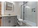 Bathroom featuring glass enclosed shower, grey vanity with granite counter, and tiled floors at 29303 E 165Th Ave, Brighton, CO 80603