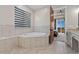 Bathroom features a tub with tile surround at 29303 E 165Th Ave, Brighton, CO 80603
