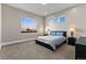 Bedroom features a large window and neutral-colored walls and carpeting at 29303 E 165Th Ave, Brighton, CO 80603
