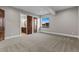 Expansive bedroom showcasing walk-in closet, soft carpet, and a large window with natural light at 29303 E 165Th Ave, Brighton, CO 80603