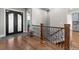An elegant entryway showcases a decorative wrought iron handrail on the stairs at 29303 E 165Th Ave, Brighton, CO 80603