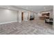 Spacious living room with luxury vinyl plank floors and natural light; basement common area at 29303 E 165Th Ave, Brighton, CO 80603