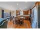 Gourmet kitchen featuring granite counters, stainless steel appliances, and center island at 6461 S Ider St, Aurora, CO 80016
