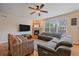 Bright living room showcasing a cozy fireplace and hardwood floors at 6461 S Ider St, Aurora, CO 80016