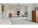 The home's large bedroom has an office space and carpeted floor at 14675 Golden Eagle Run, Broomfield, CO 80023