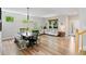 Bright living room with hardwood floors, neutral paint, and stylish furnishings at 14675 Golden Eagle Run, Broomfield, CO 80023