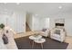 Bright, neutral living room with comfortable seating and decor at 14675 Golden Eagle Run, Broomfield, CO 80023
