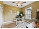 The dedicated office space is bright with a light color palette and large window at 14675 Golden Eagle Run, Broomfield, CO 80023