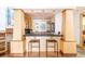 Stylish home bar featuring ample counter space, custom cabinetry, and pendant lighting at 1070 Cypress Way, Castle Rock, CO 80108