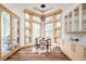 Charming breakfast nook with beautiful wood-framed windows that let in natural light at 1070 Cypress Way, Castle Rock, CO 80108