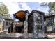 Stunning home exterior showcasing an outdoor pool, modern design, and large windows at 1070 Cypress Way, Castle Rock, CO 80108