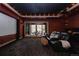 Home theater boasting a projector screen, comfortable seating, and elegant lighting at 1070 Cypress Way, Castle Rock, CO 80108