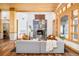Cozy living room with a stone fireplace, hardwood floors and open floor plan at 1070 Cypress Way, Castle Rock, CO 80108