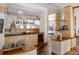 Stylish living space boasting built-in shelves, modern appliances, and a sleek design at 1070 Cypress Way, Castle Rock, CO 80108