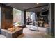 Relaxing outdoor patio features a cozy fire pit, built-in grilling area, and modern outdoor kitchen at 1070 Cypress Way, Castle Rock, CO 80108