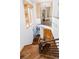 Modern staircase with hardwood steps, iron railings, and natural light at 1070 Cypress Way, Castle Rock, CO 80108