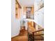 Striking staircase with custom glass and woodwork, and views of multiple levels at 1070 Cypress Way, Castle Rock, CO 80108