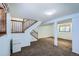 The finished basement has carpet flooring and features a staircase to the upper floors at 2603 W 100Th Pl, Denver, CO 80260