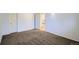 Comfortable bedroom space features neutral carpet, white walls, and closet and ensuite access at 2603 W 100Th Pl, Denver, CO 80260