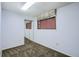 This bedroom features neutral colored walls and carpets, a privacy window blind, and a closet with mirrored doors at 2603 W 100Th Pl, Denver, CO 80260