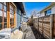 Cozy backyard with a patio and a wooden fence, providing a private outdoor space at 5094 Meade St, Denver, CO 80221