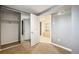 Bedroom featuring an adjoining closet with mirrored doors at 5094 Meade St, Denver, CO 80221