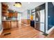 Modern kitchen featuring granite countertops, wood cabinets and stainless steel appliances at 5094 Meade St, Denver, CO 80221