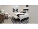 Stylish bedroom features neutral tones, carpeted floors, and modern decor at 130 S Eaton St, Lakewood, CO 80226