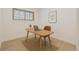 Bright office features a wood desk, modern chair, and large window at 130 S Eaton St, Lakewood, CO 80226