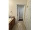 Bathroom featuring tile flooring, vanity, and lighting at 14241 Ivanhoe St, Thornton, CO 80602