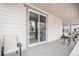 Enjoy relaxing outdoors on this spacious back porch with easy access to the home through sliding doors at 2598 Knobbie Cir, Castle Rock, CO 80109