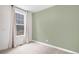 Comfortable bedroom featuring a neutral color scheme and large windows at 2598 Knobbie Cir, Castle Rock, CO 80109