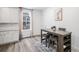 Open dining area with a pub table and upholstered chairs offers a cozy place for Gathering meals at 2598 Knobbie Cir, Castle Rock, CO 80109