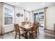 Cozy dining room featuring a wood table, chairs and sliding glass doors at 2598 Knobbie Cir, Castle Rock, CO 80109