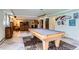 Basement with a pool table, tile floors, and a living area at 3906 Hoyt Ct, Wheat Ridge, CO 80033