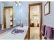 Charming bathroom featuring a unique sink and fixtures with a view into the main bedroom at 3906 Hoyt Ct, Wheat Ridge, CO 80033
