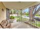 Covered front porch provides an inviting space for relaxing and enjoying the neighborhood views at 3906 Hoyt Ct, Wheat Ridge, CO 80033