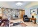 Inviting living room featuring a stone fireplace and comfortable seating at 3906 Hoyt Ct, Wheat Ridge, CO 80033